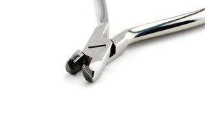 Distal End Safety Hold Cutter